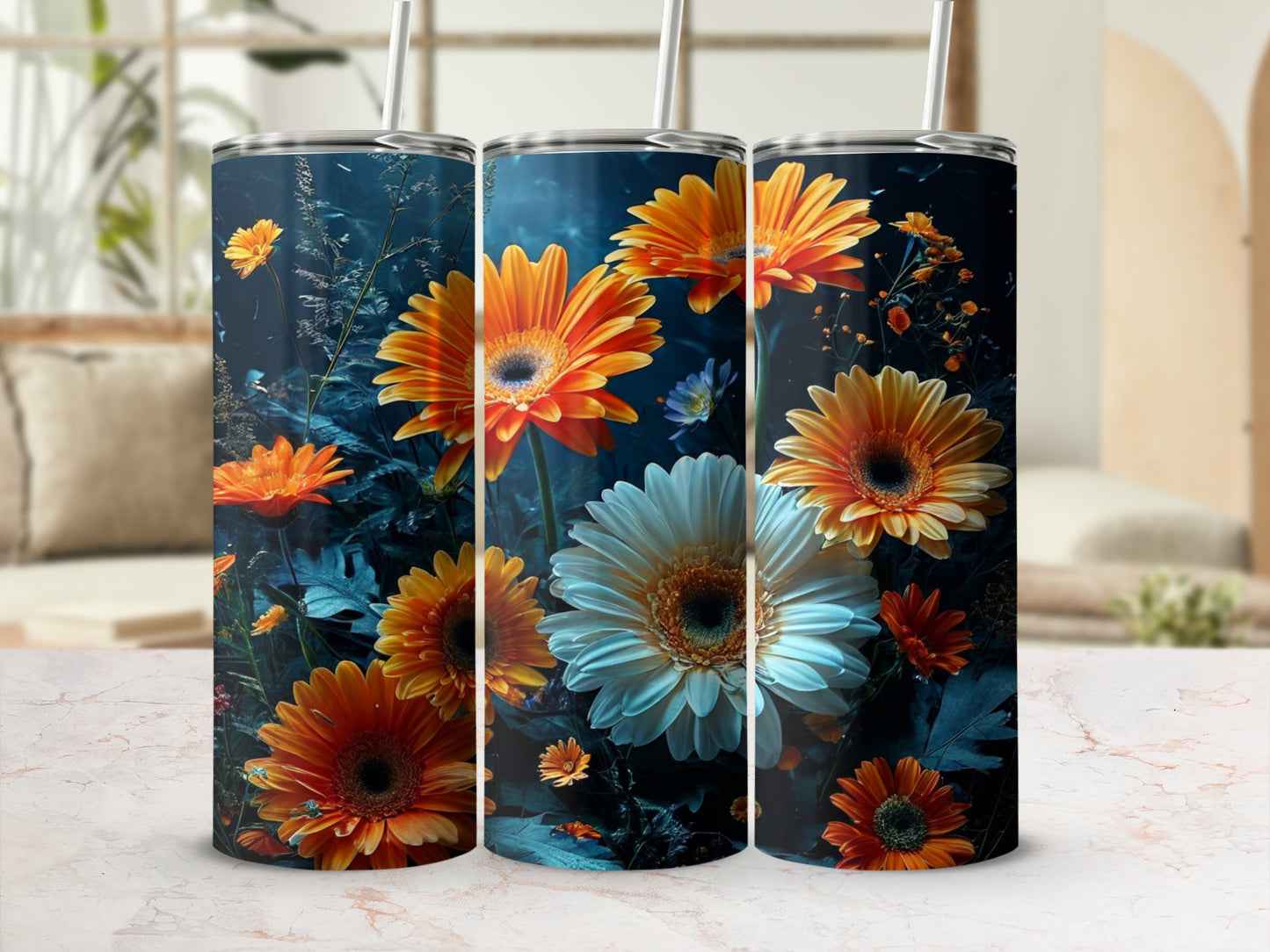 Three tumblers with vibrant orange and white gerbera daisies on dark background.