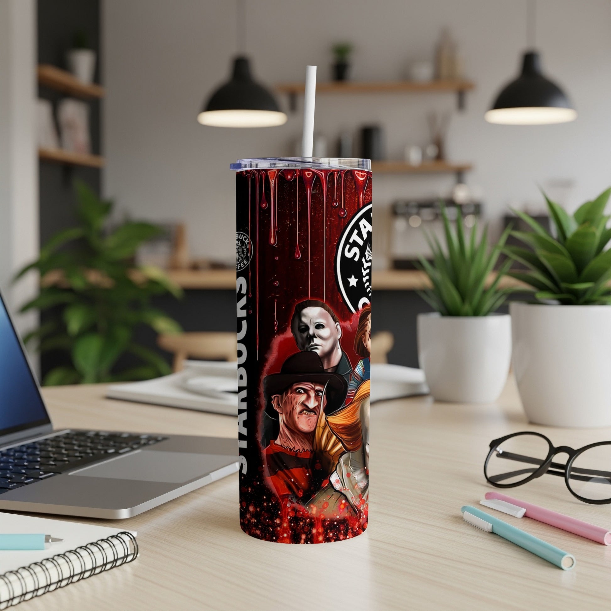 Horror movie characters on a Starbucks-themed tumbler with a red, dripping design.