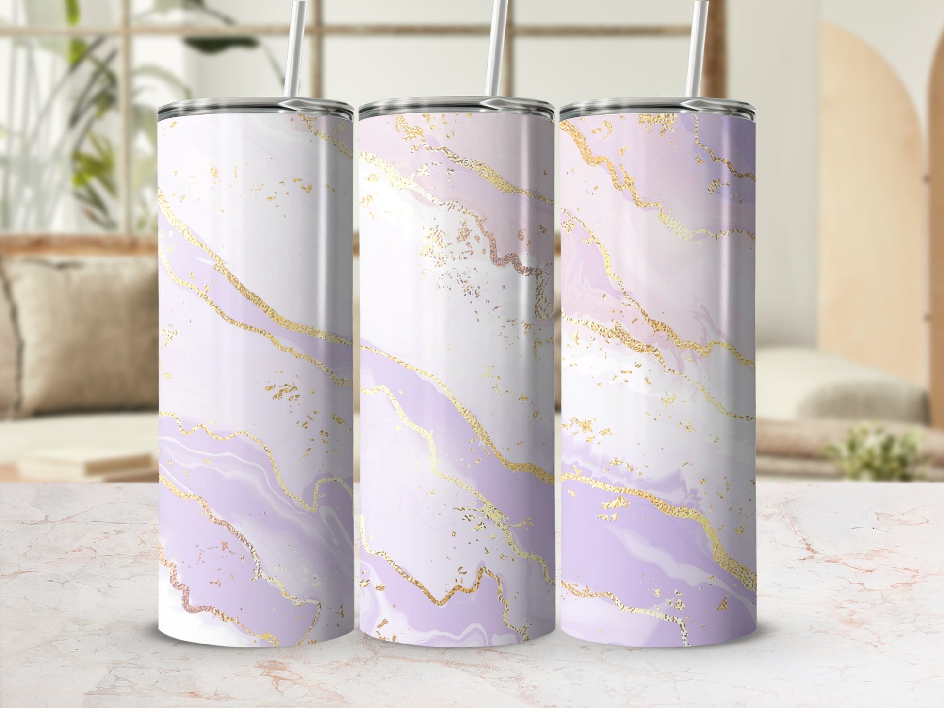 Three tumblers with a marbled lavender and gold design.