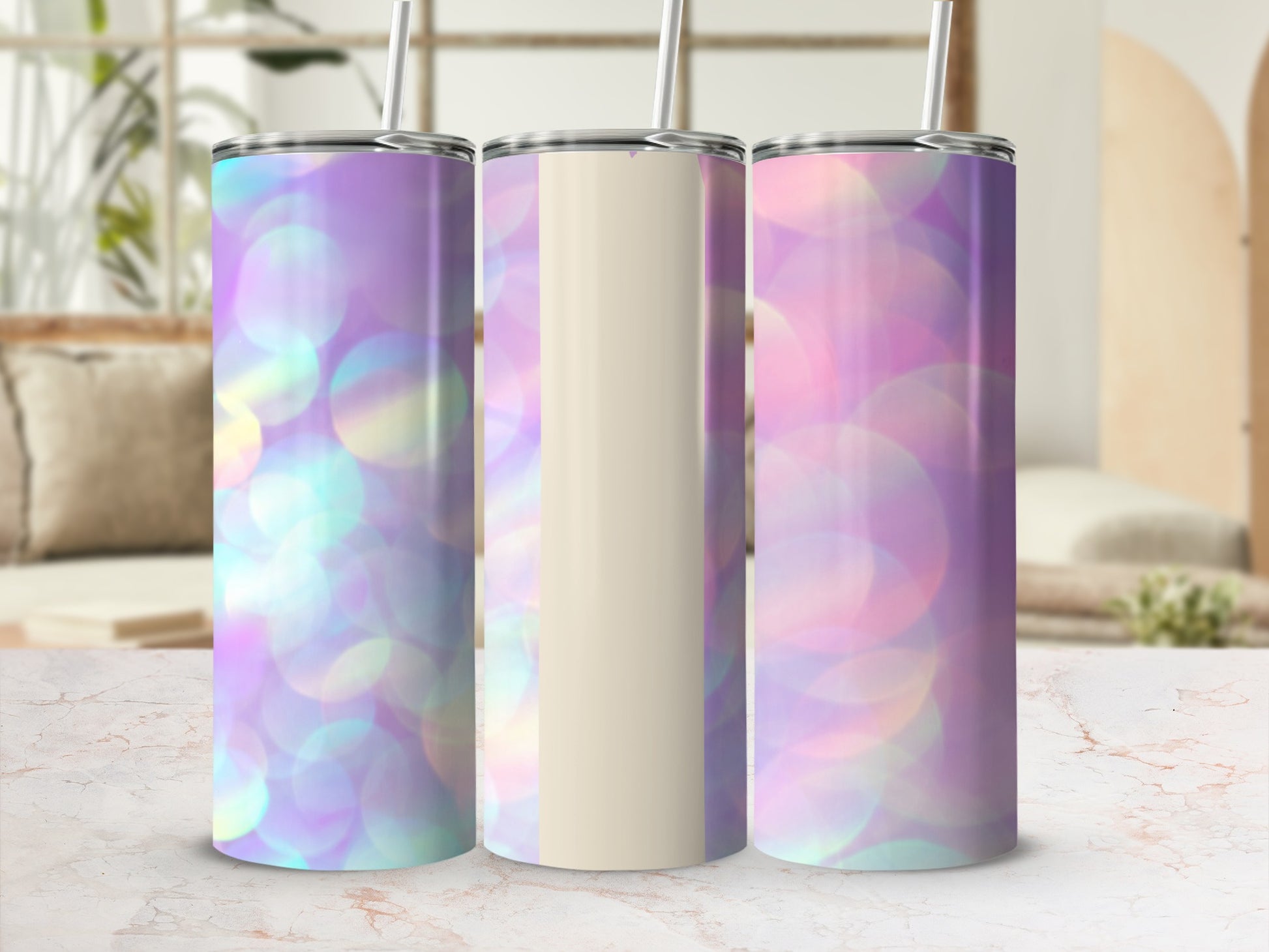 Three tumblers with iridescent bokeh background pattern.
