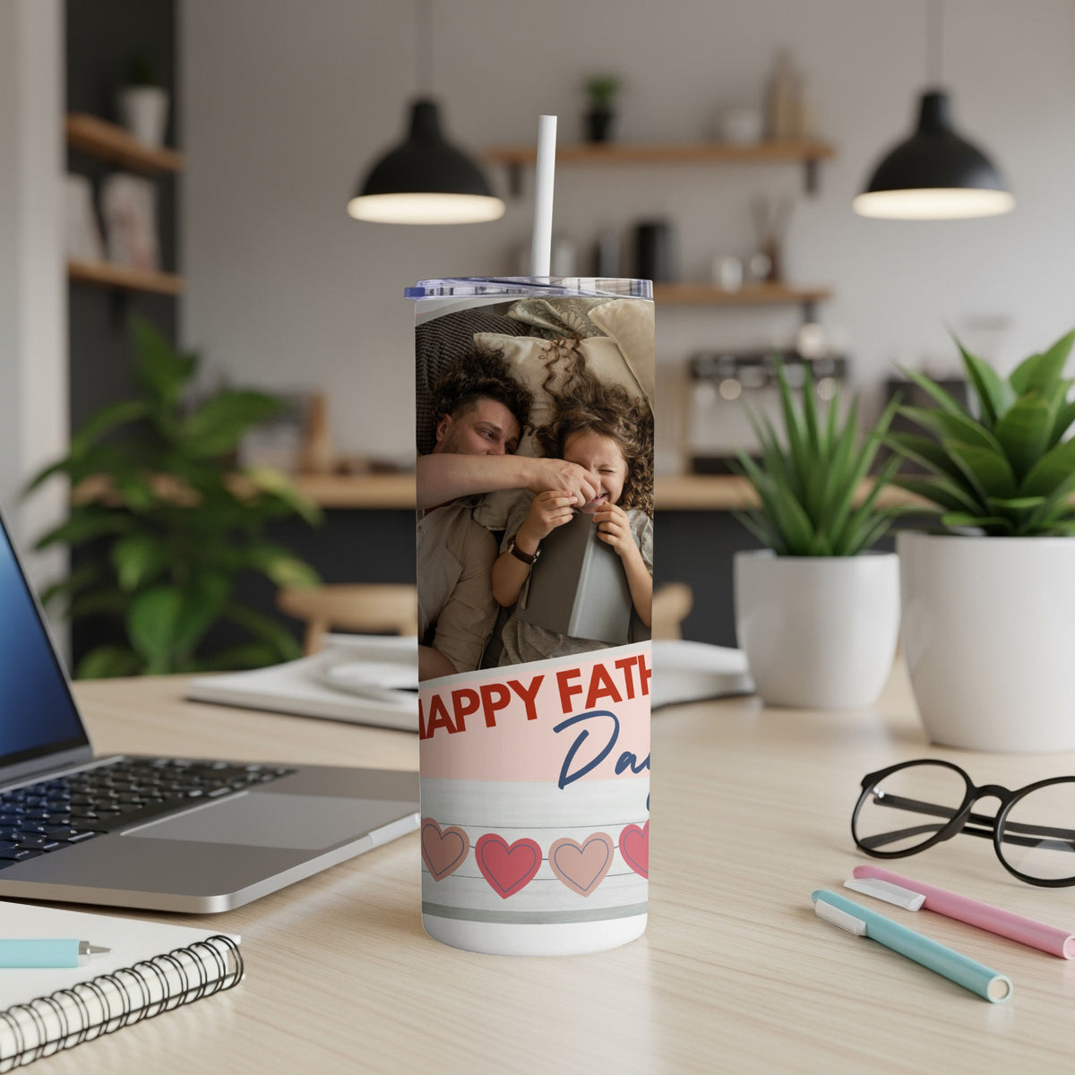 Tumbler with a father and child photo, "Happy Father's Day" text, and hearts.