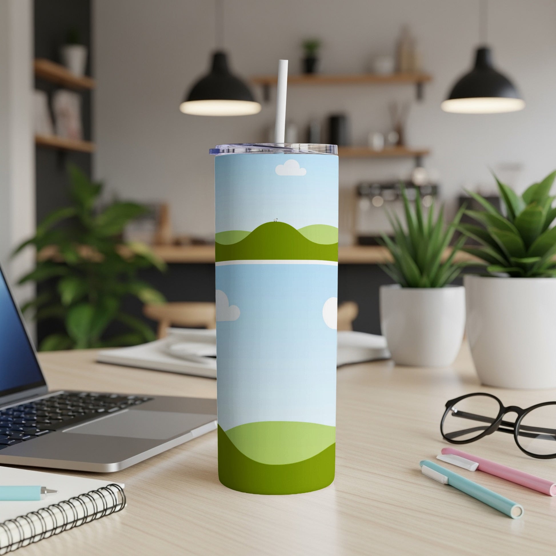 Tumbler with a minimalist landscape and sky design, featuring rolling green hills and clouds.