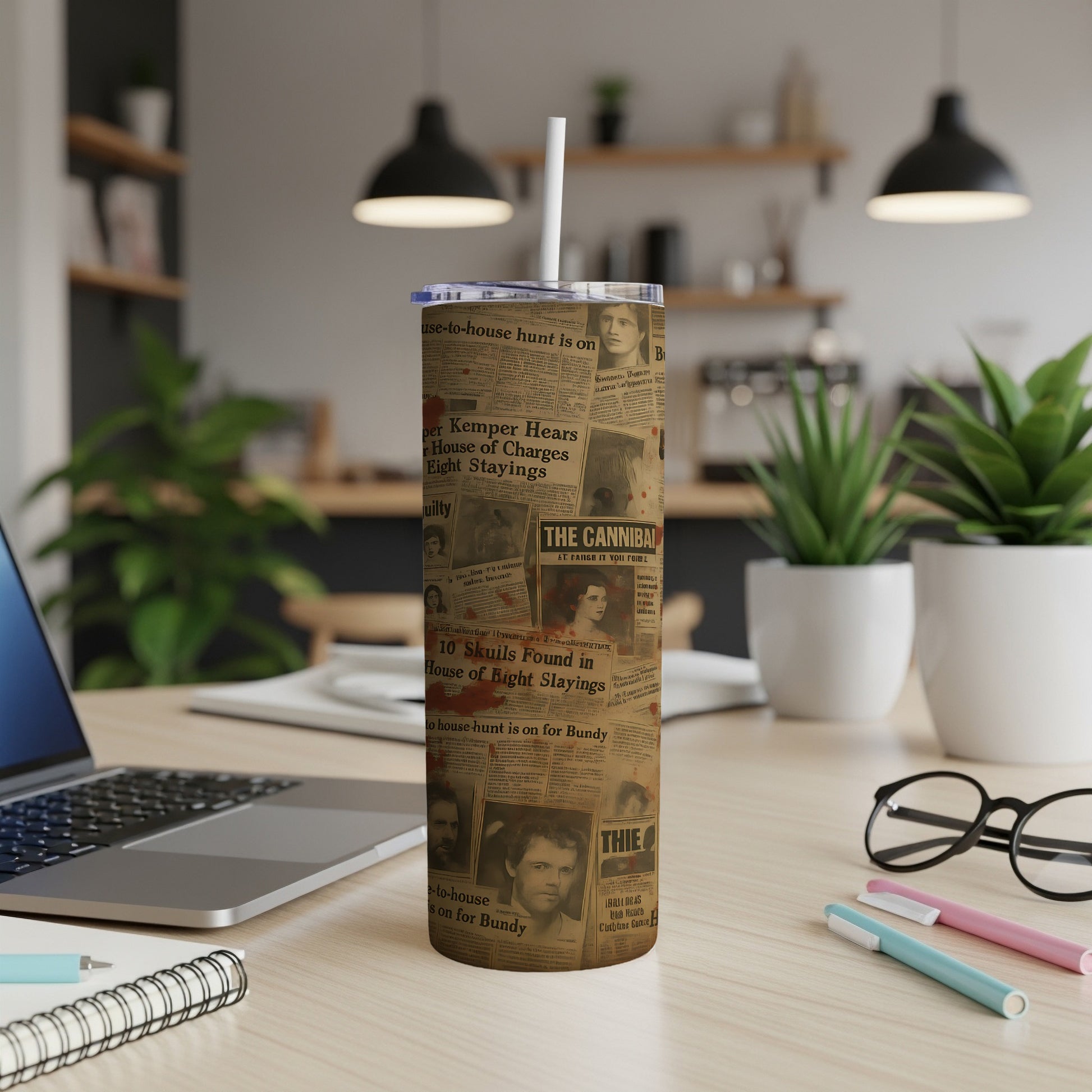 Tumbler with vintage newspaper clippings featuring crime headlines and portraits.