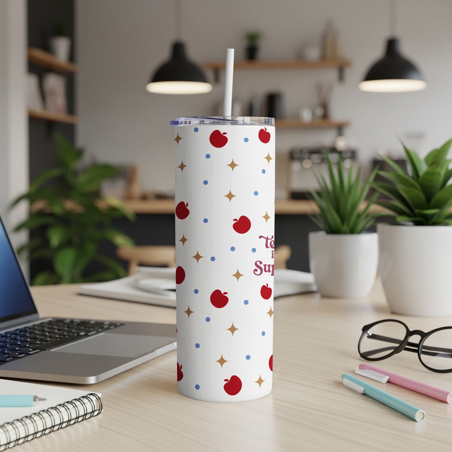 White tumbler with red apples and gold stars, and text that reads "Teachy Super".