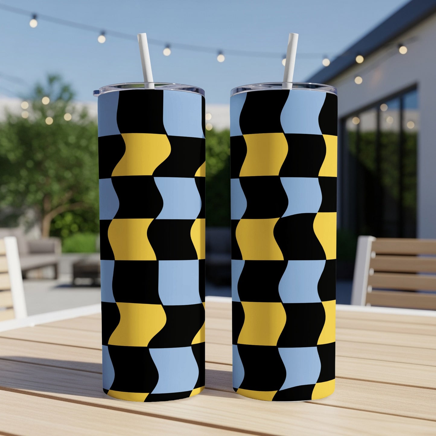 Two tall tumblers with a black, yellow, and blue checkerboard pattern.