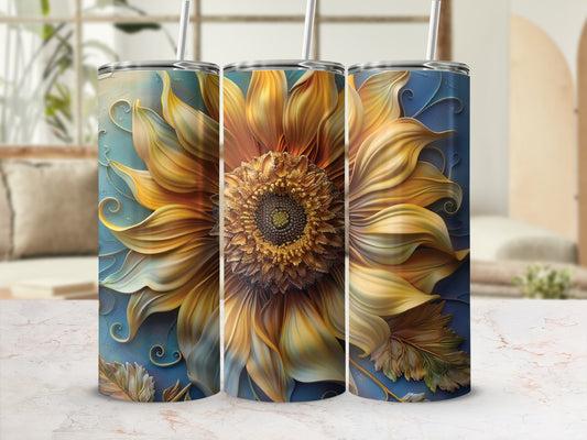 Three tumblers featuring a large, detailed sunflower design on a blue background.