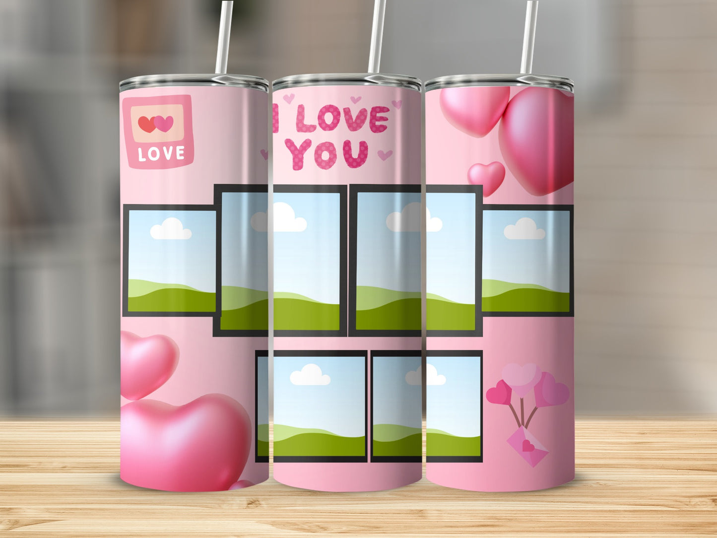 Pink tumblers with "I LOVE YOU" text and heart graphics, ready for photos.