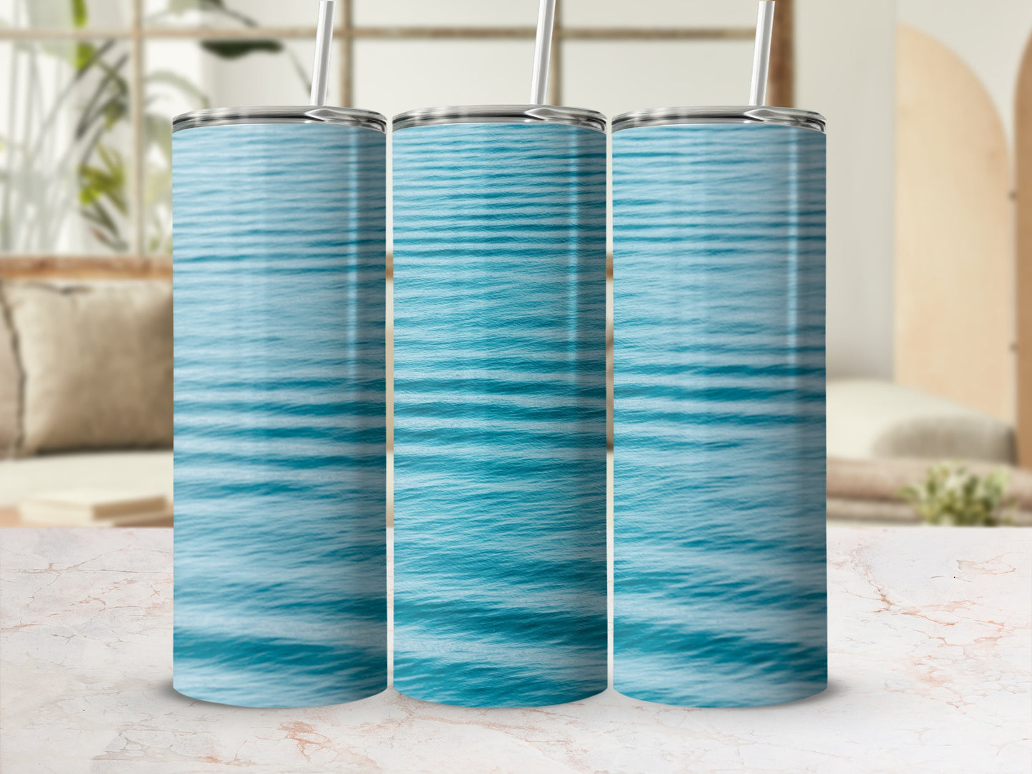 Three tumblers with a blue water ripple pattern.