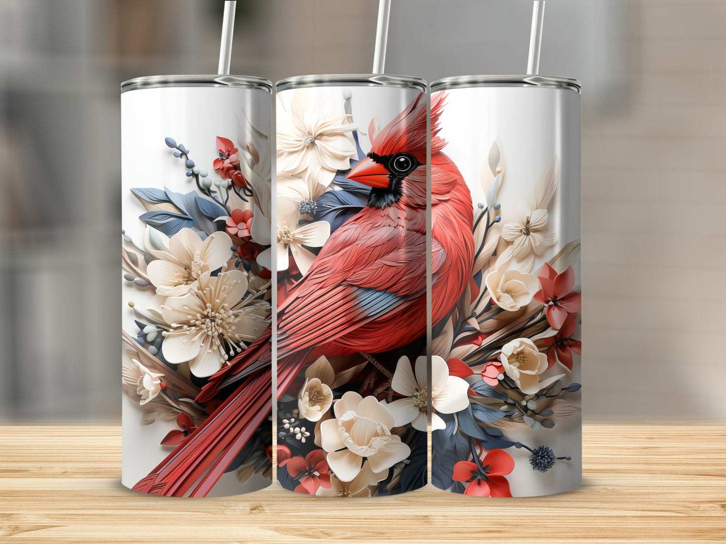 Red cardinal with floral accents on a white tumbler.
