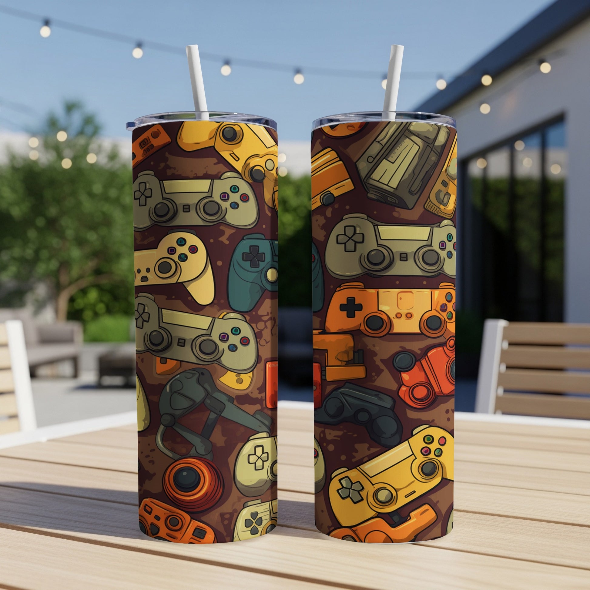 Two tumblers with a repeating pattern of retro video game controllers.