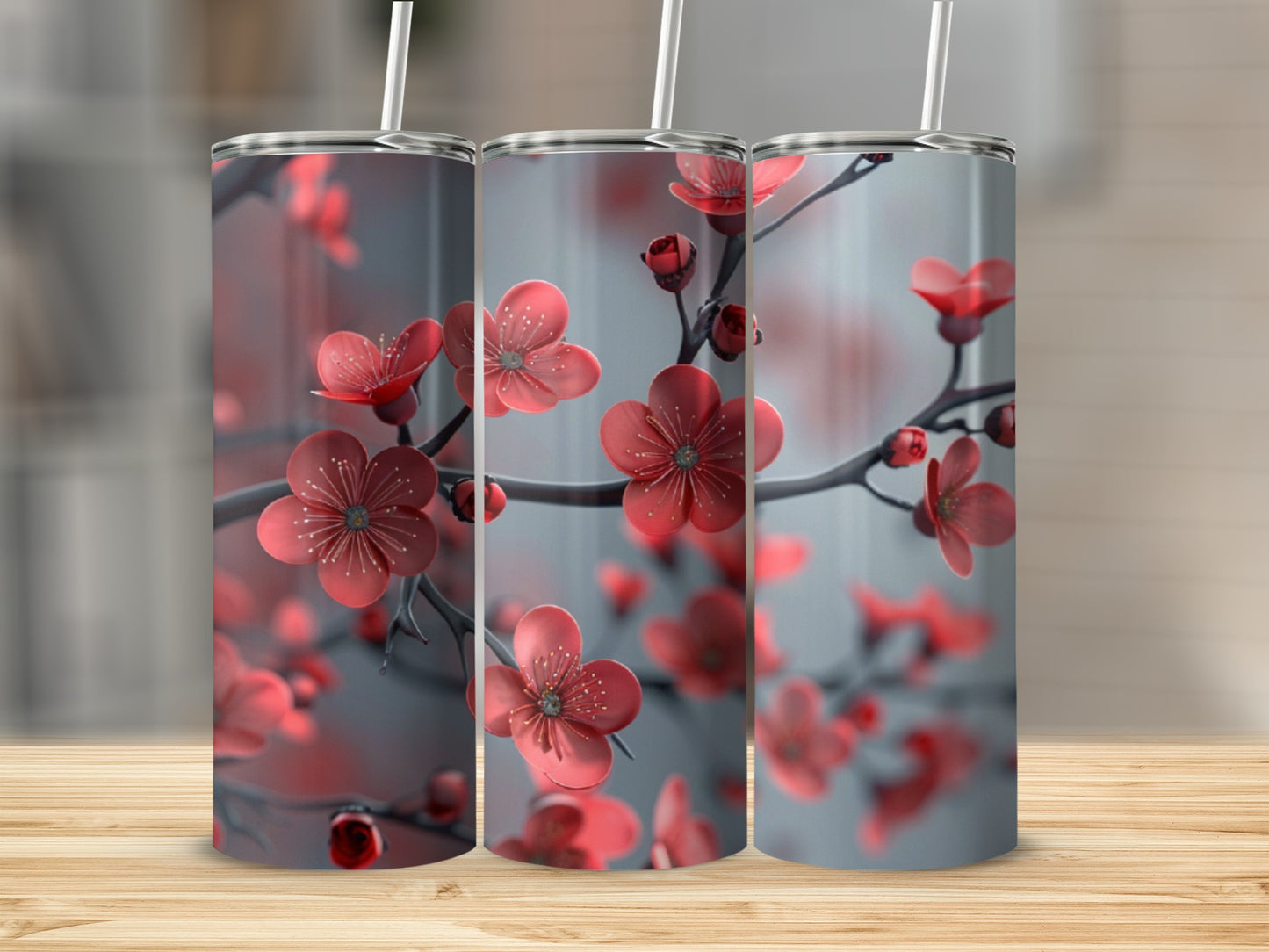 Three tumblers with a red cherry blossom floral design.