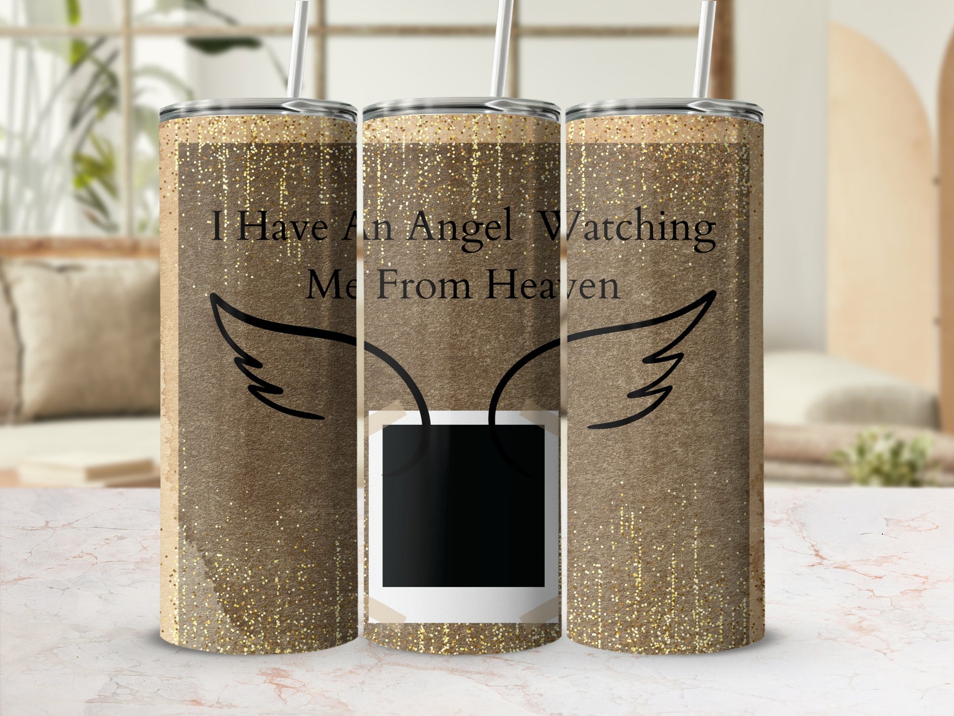 Gold glitter tumbler with "I Have An Angel Watching Me From Heaven" and angel wings.