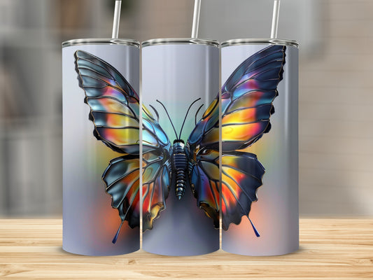 Three tumblers with iridescent butterfly designs against a blurred background.