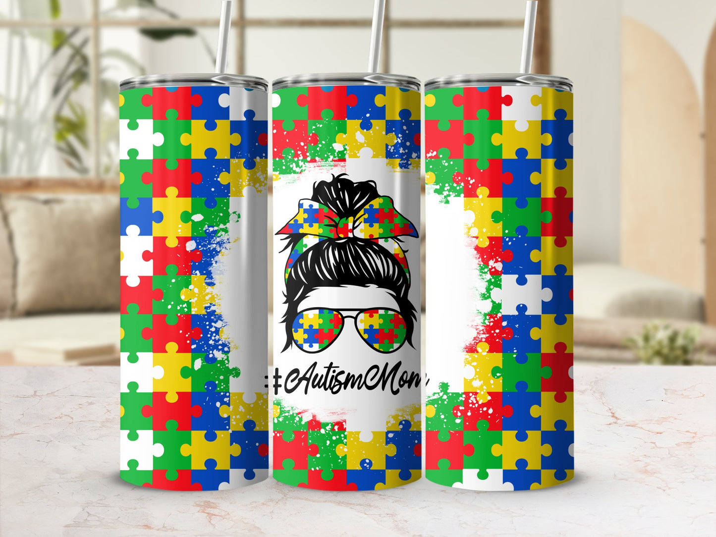 Autism Mom tumbler with puzzle piece border and messy bun graphic.
