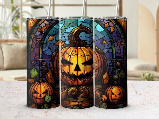 Three stained-glass style tumblers featuring jack-o'-lanterns and autumn leaves.