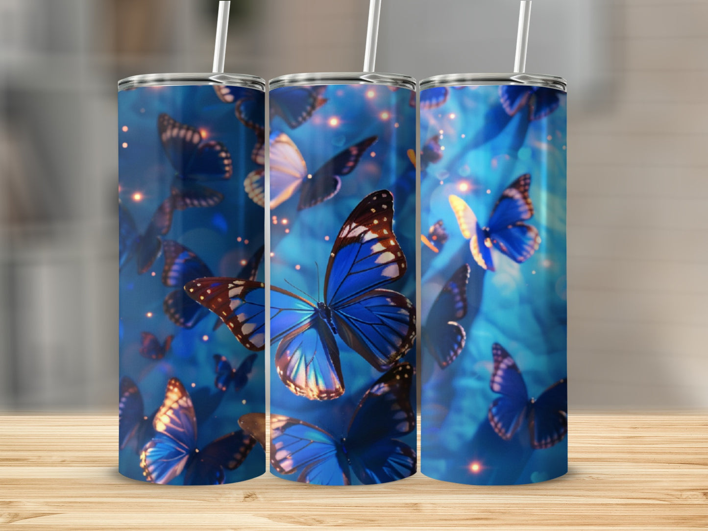 Blue butterflies against a bokeh background on a skinny tumbler.