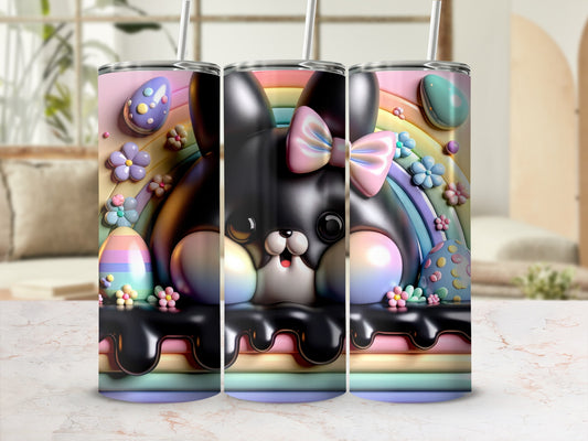 Black bunny with pink bow, pastel rainbow, and Easter eggs on a tumbler.