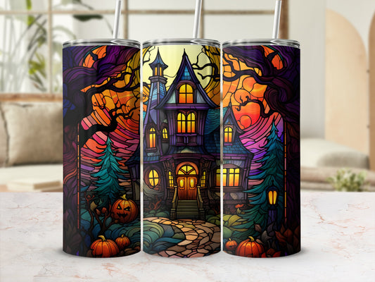 Spooky haunted house with pumpkins and trees at sunset.