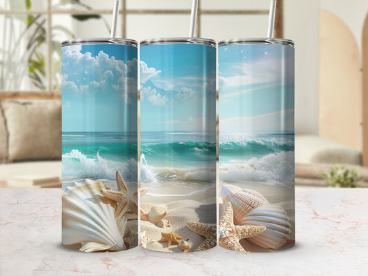 Three beach-themed tumblers with seashells and ocean waves.