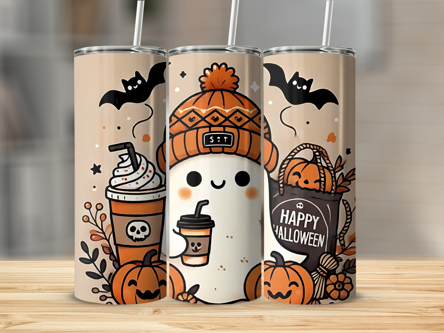 Three tumblers with Halloween ghost, pumpkin, bat, and coffee cup designs.