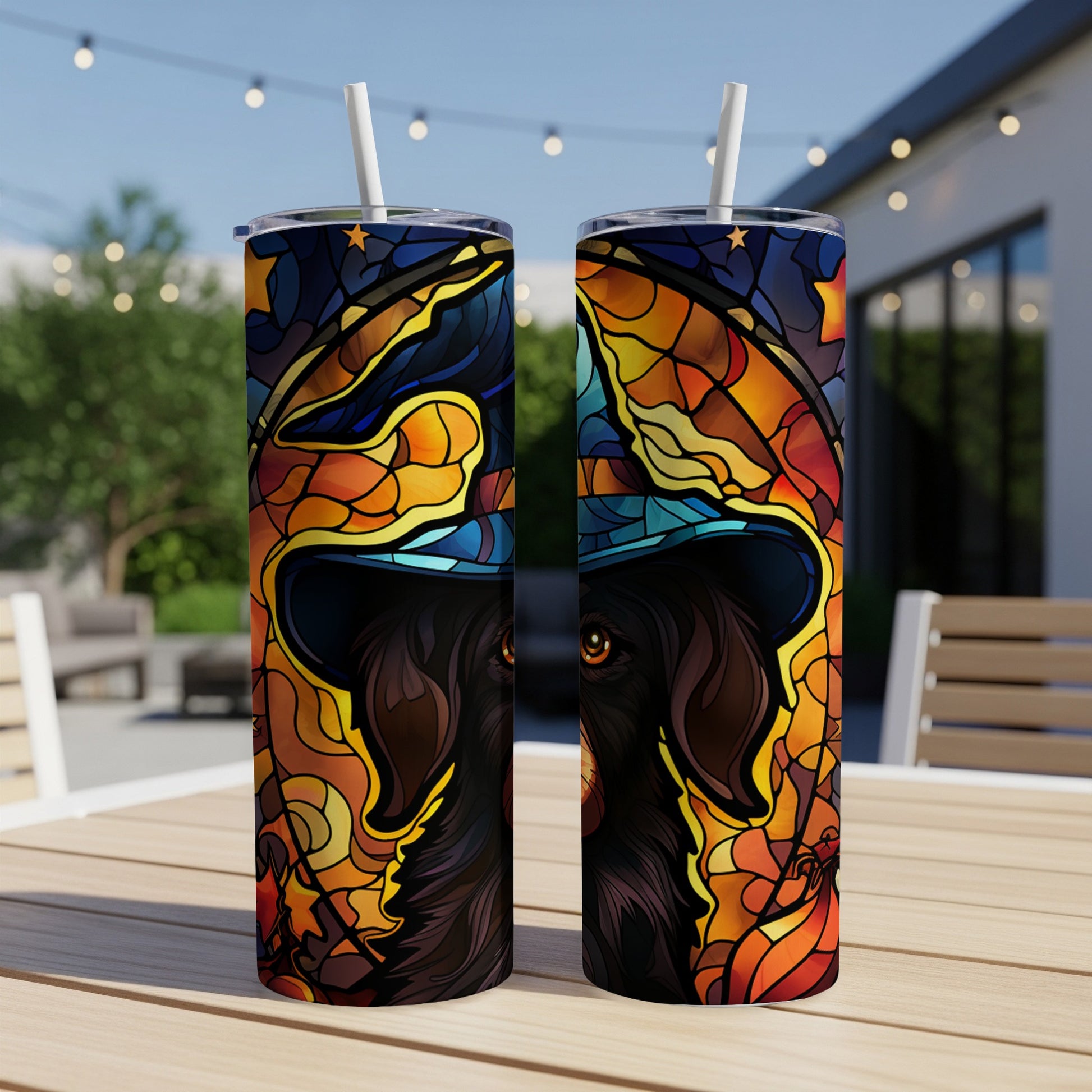 Dog wearing a stained-glass witch hat, two tumblers side-by-side.