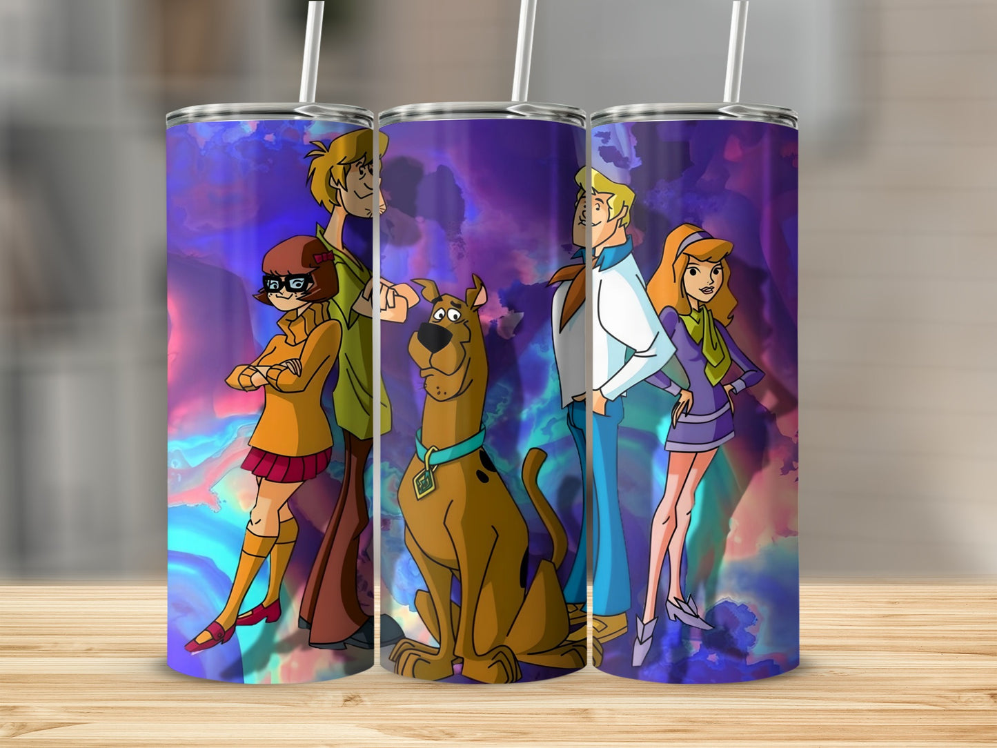 Scooby-Doo and the gang on a purple marbled background tumbler.
