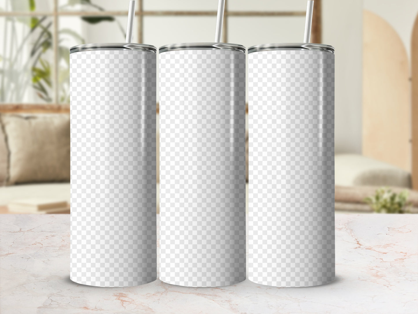 Three blank sublimation tumblers with straws on a marble surface.
