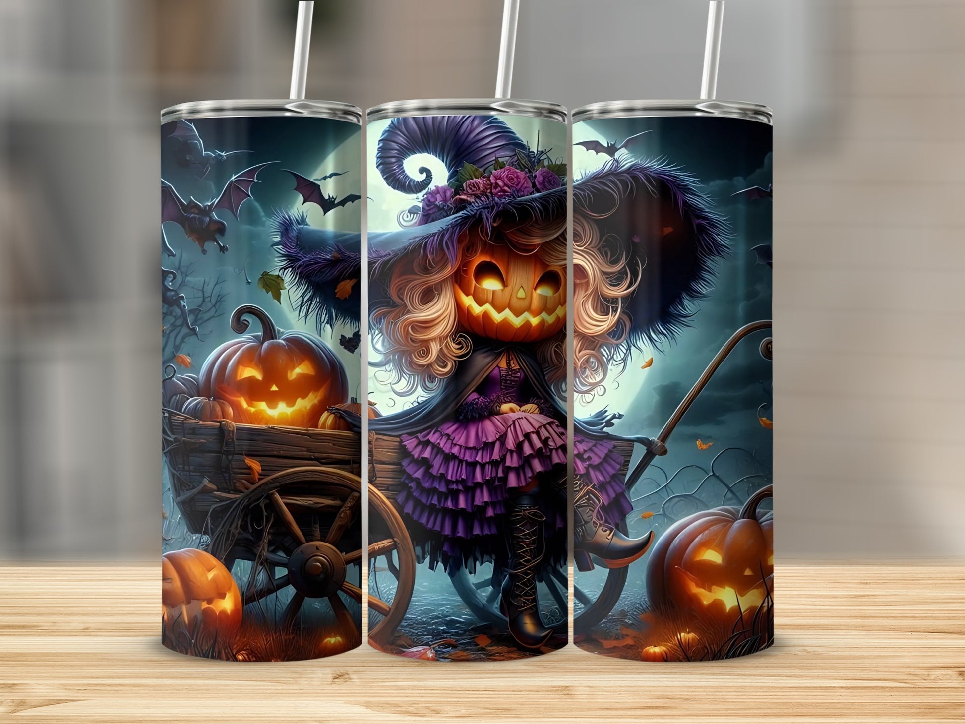 Halloween tumbler with jack-o'-lantern witch, bats, and pumpkins in a wagon.
