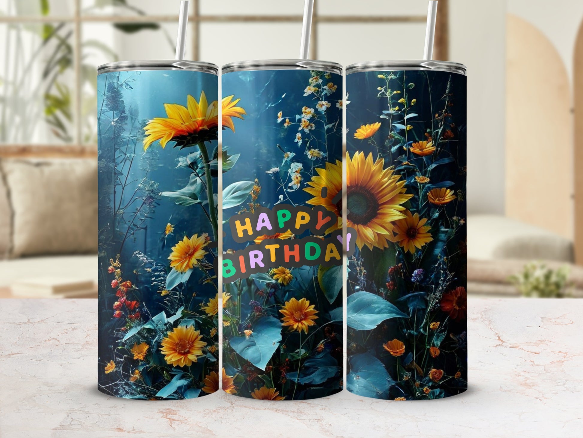 Three tumblers featuring sunflowers and a "Happy Birthday" message against a dark, floral background.