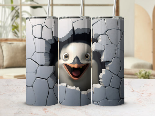 Cracked wall revealing surprised penguin face on a white tumbler.