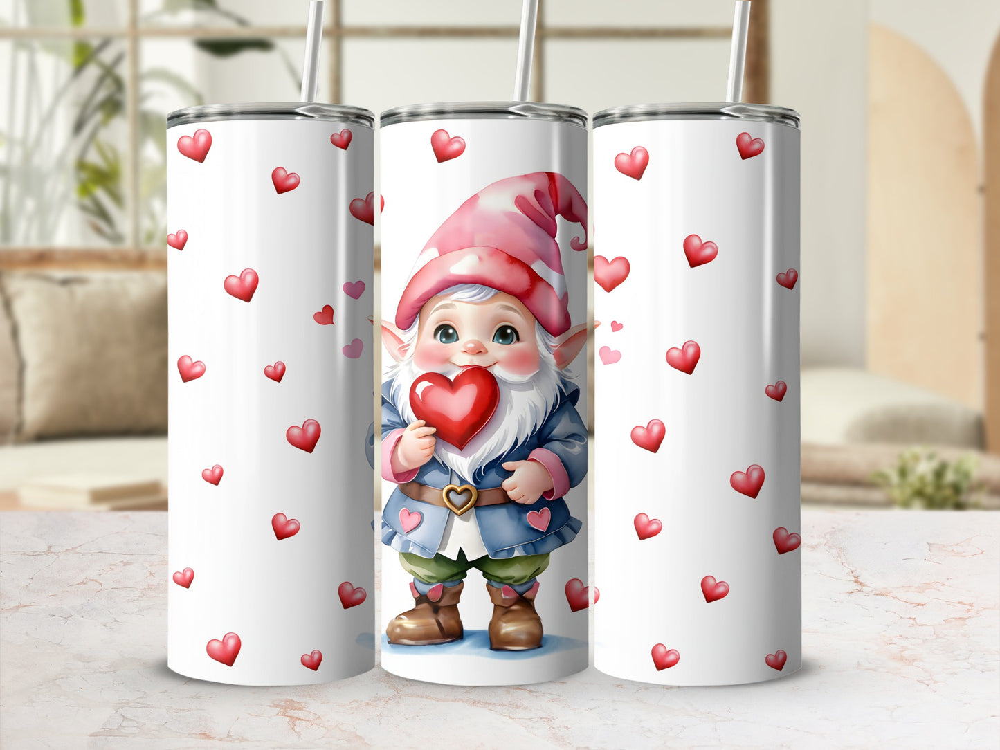 Three tumblers decorated with gnomes and red hearts.