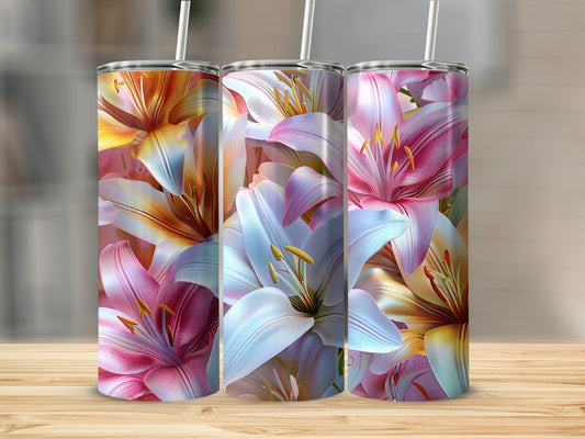 Three tall tumblers with a colorful lily flower design.