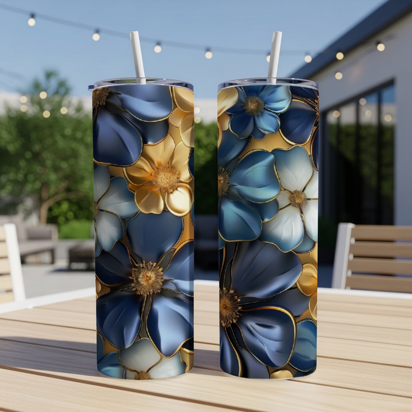Two tumblers with floral pattern of blue and gold flowers.