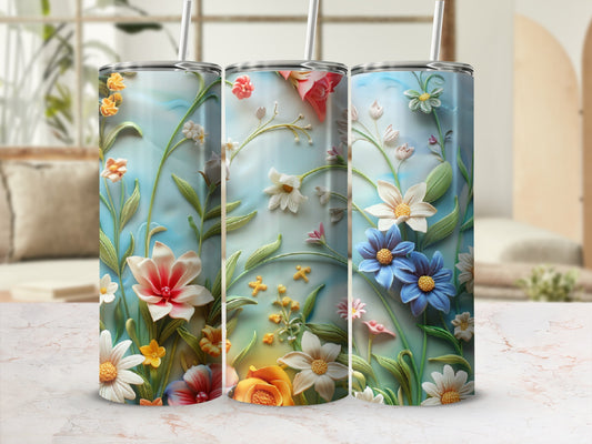 Three tumblers with a 3D floral design on a blurred background.
