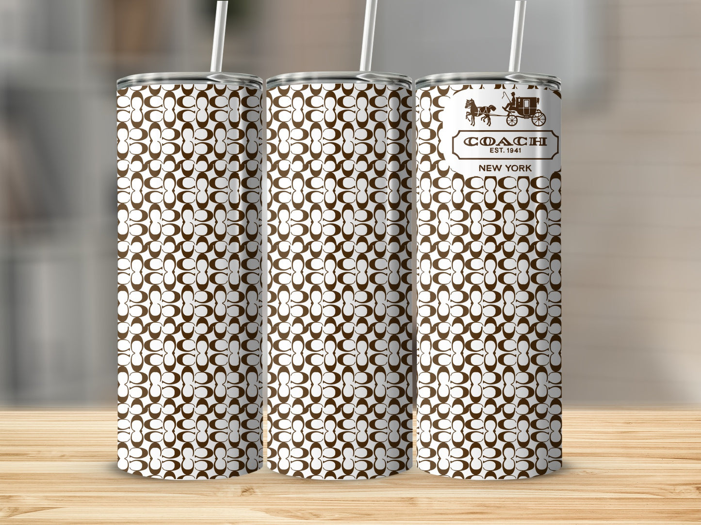 Coach tumbler with brown and white repeating logo pattern, and Coach logo.