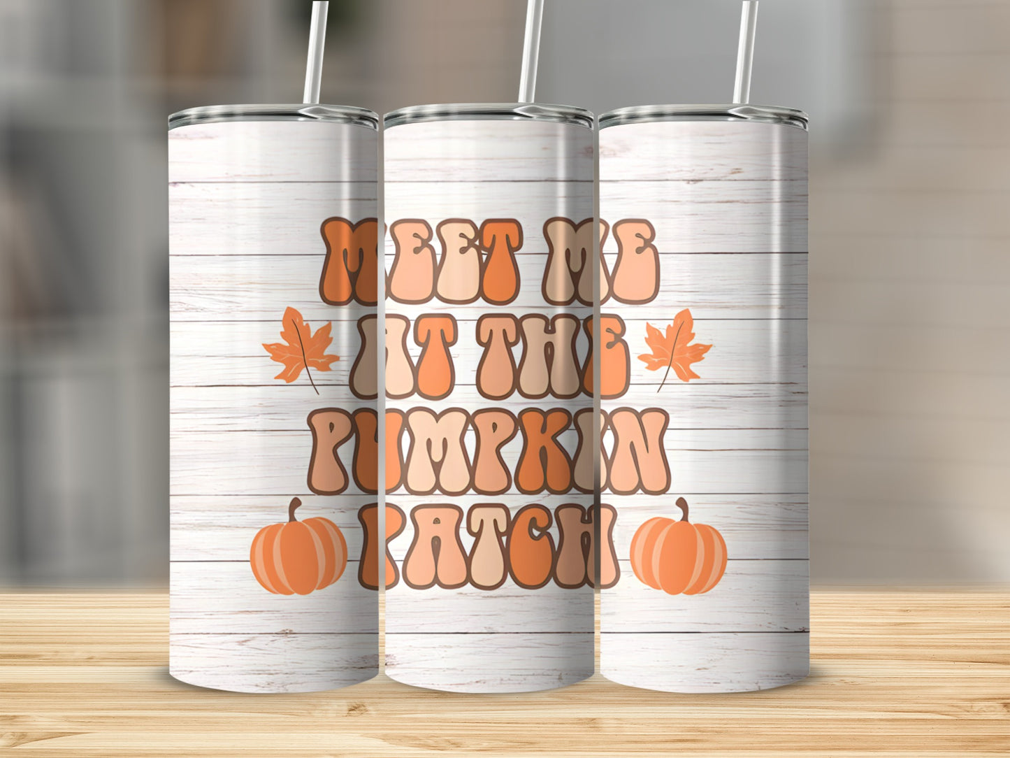 Meet Me at the Pumpkin Patch tumbler with pumpkins and leaves.