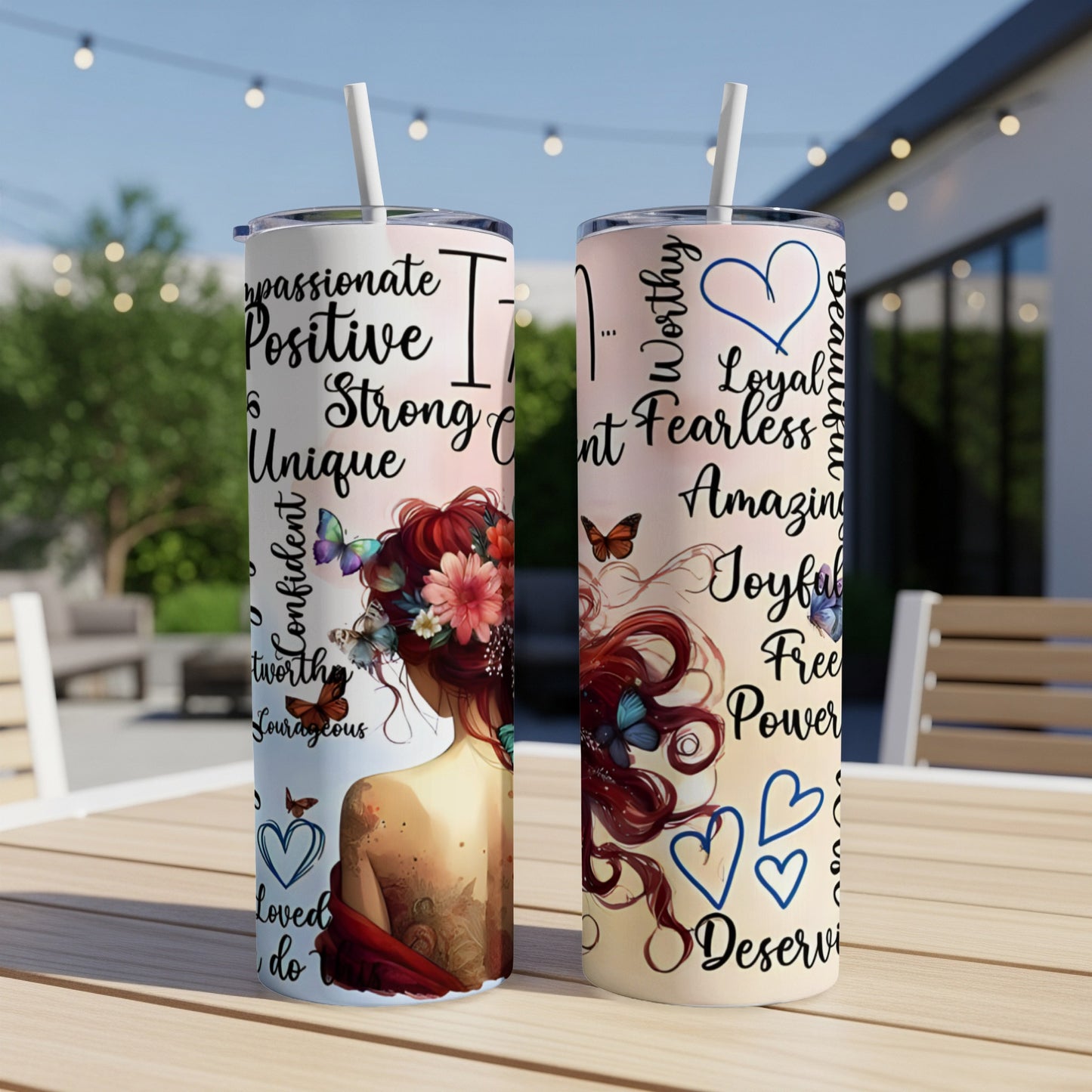Two tumblers with inspirational words and butterfly designs.