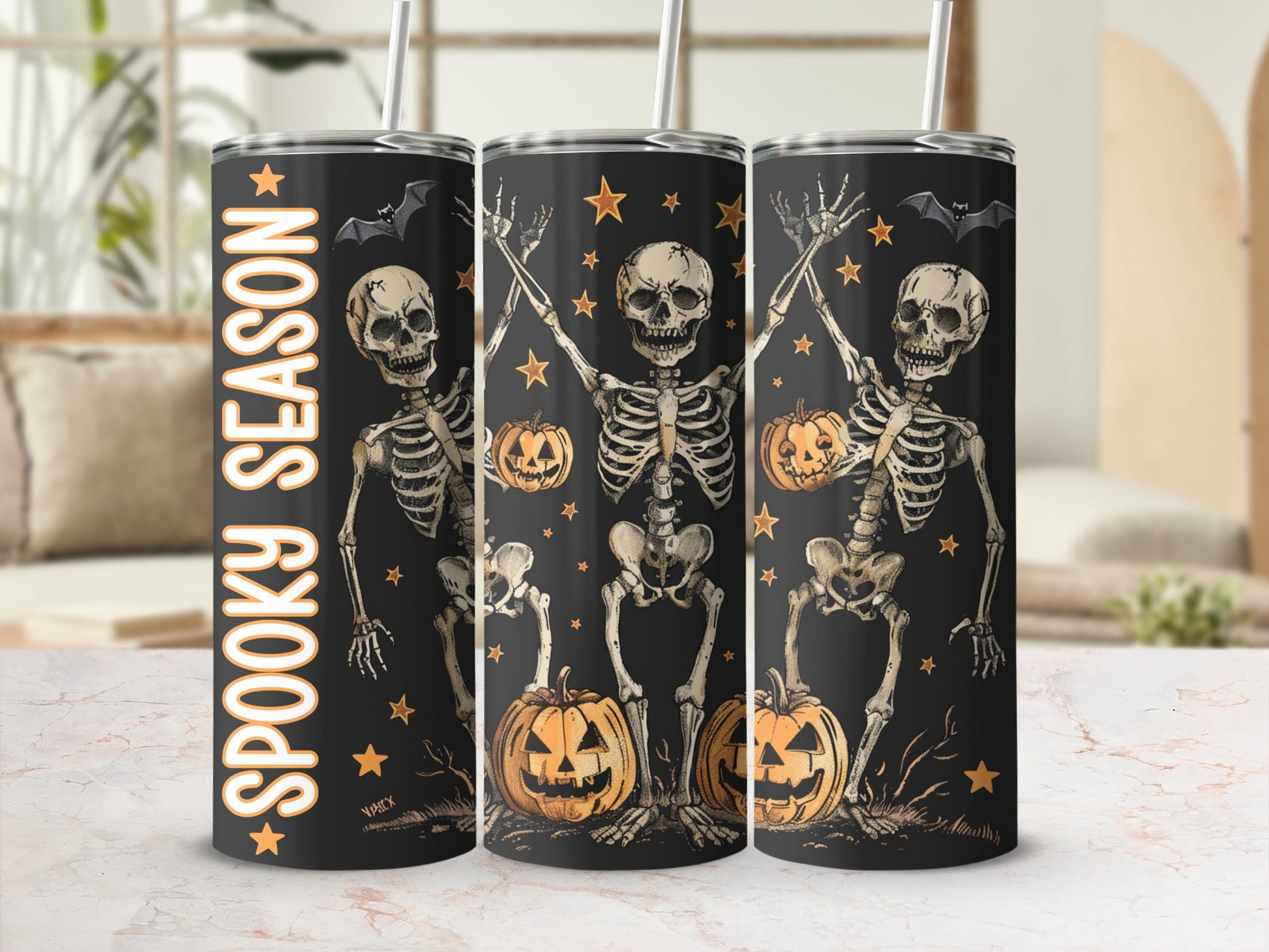 Tumblers feature skeletons, pumpkins, bats, and stars with "Spooky Season" text.