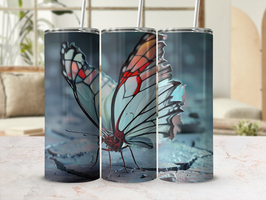 Tumbler with a close-up of a white and red butterfly on a cracked surface.