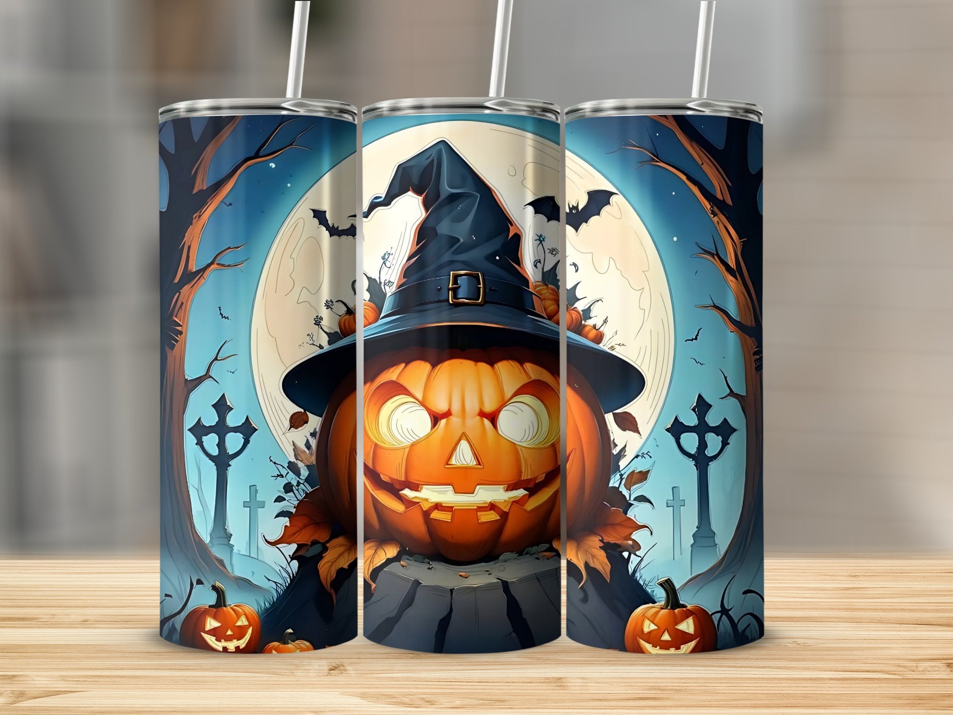 Three tumblers featuring a spooky Halloween pumpkin and graveyard scene.