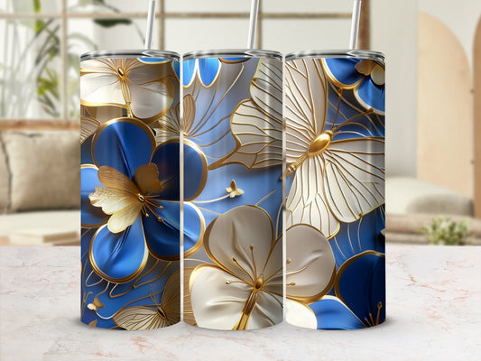 Three tumblers with blue and gold floral and butterfly design.