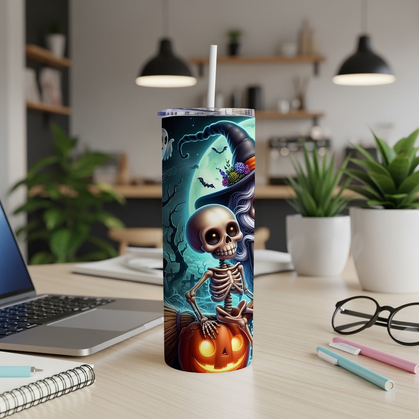 Halloween tumbler with skeleton, witch hat, pumpkin, ghost, and bats.