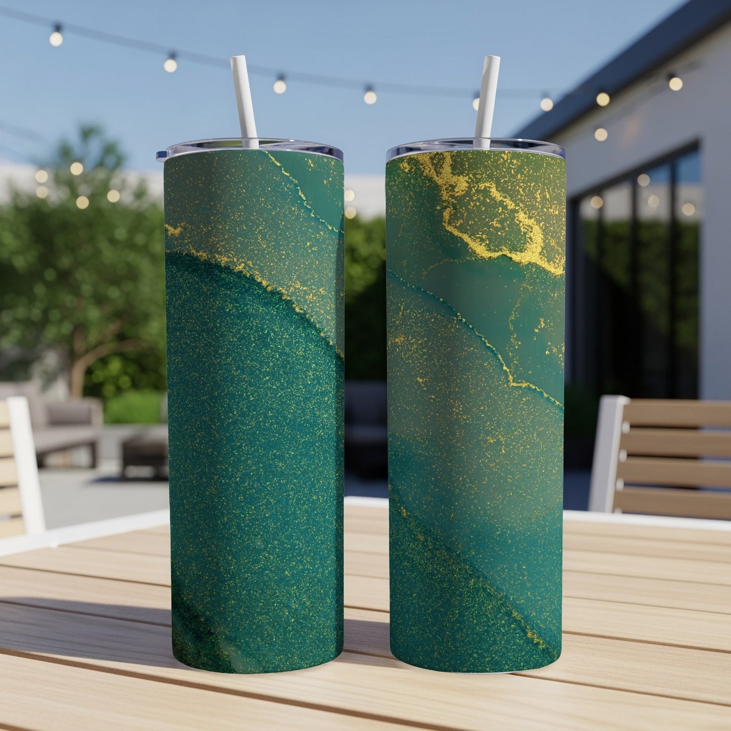 Two tall tumblers with a marbled green and gold design.