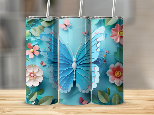 Blue butterfly and floral design on three cylindrical tumblers.