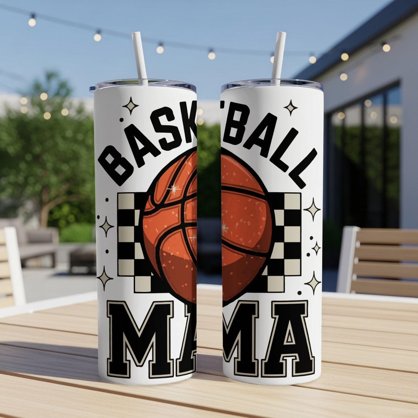 Two basketball mama tumblers with checkered pattern and straws.