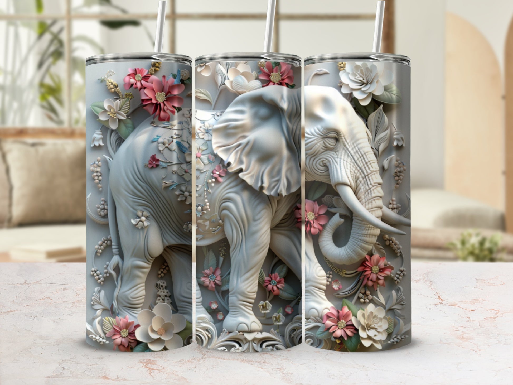 Gray tumbler with a detailed elephant and floral design.