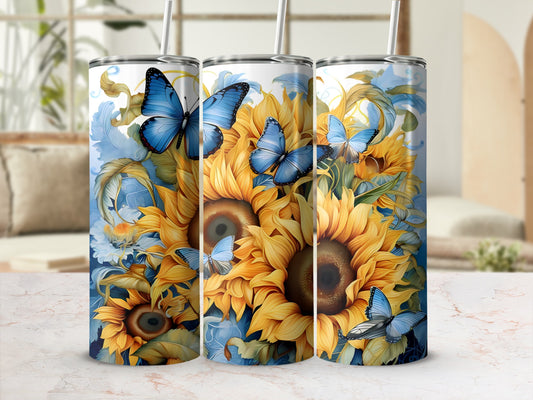 Sunflowers and blue butterflies on a white tumbler with straw.