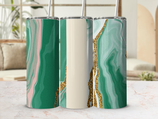Three green marble tumblers with gold and pink accents and straws.