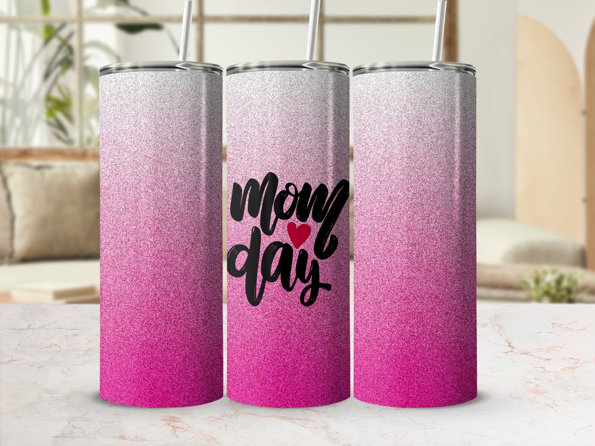 Pink ombre glitter tumbler with "Mom day" text and heart.