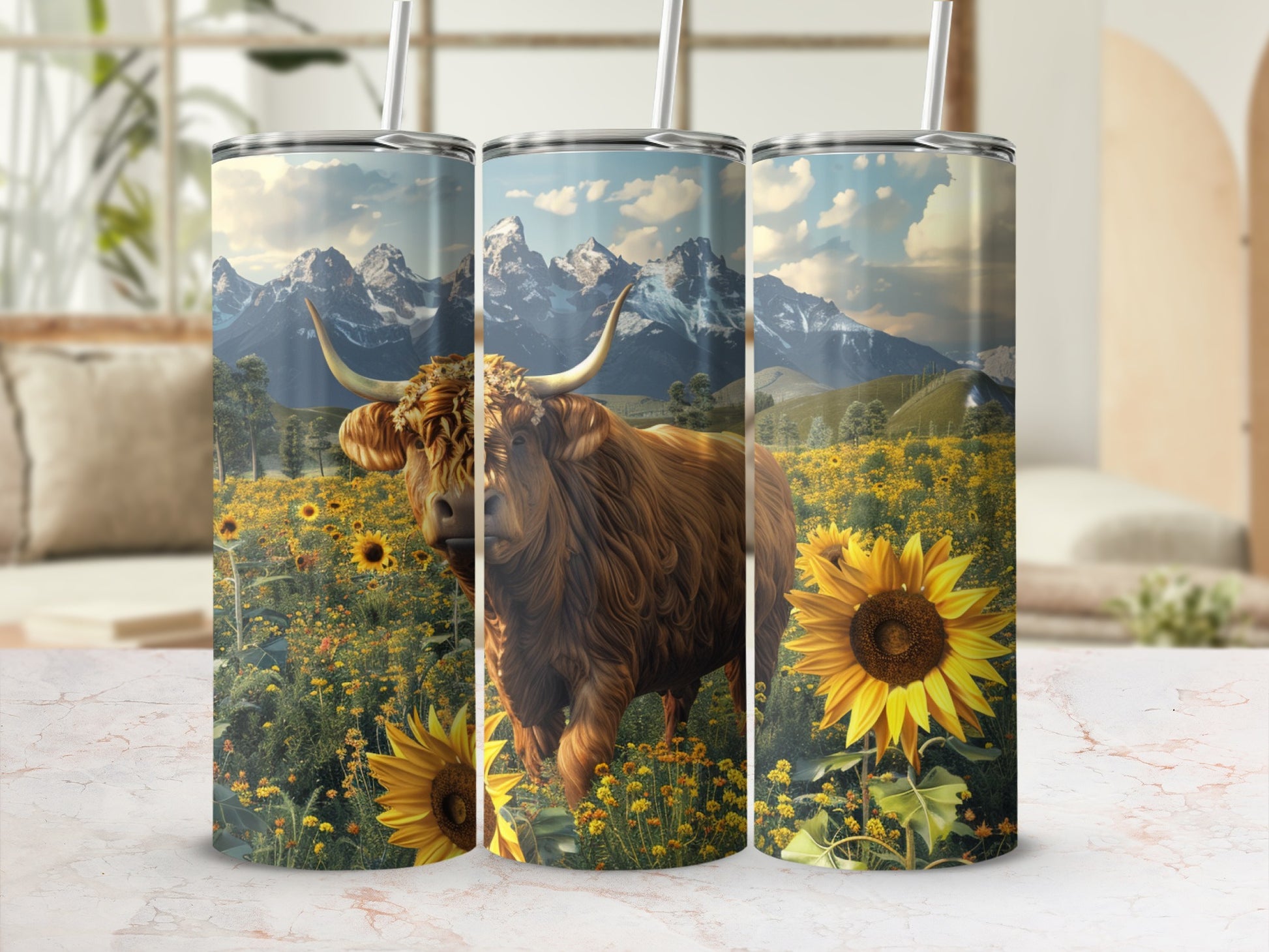 Highland cow in a field of sunflowers with mountains in the background.